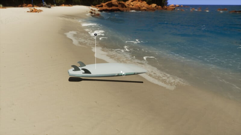 A surfboard lying upside down on a sandy beach near the gentle waves of the ocean. The shoreline curves with greenery and rocks in the background. The ocean is a bright blue under a clear sky.