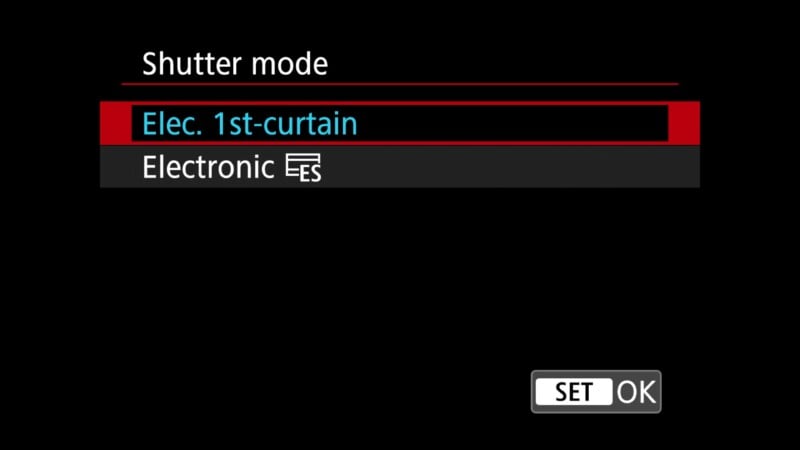 Camera menu screen showing "Shutter mode" options. "Elec. 1st-curtain" is highlighted in blue, while "Electronic" is below it in gray. The bottom right displays "SET" and "OK" buttons.