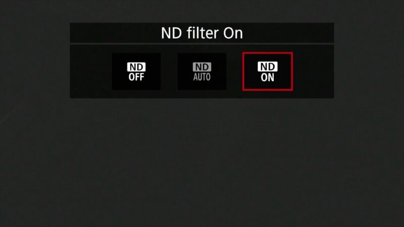 Camera screen displaying ND filter options: ND OFF, ND AUTO, and ND ON. The "ND ON" option is highlighted with a red border, indicating it is currently selected. The background is dark gray.