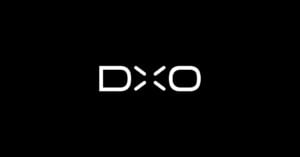 The image features a black background with the letters "DXO" in white, bold, modern font centered in the middle.