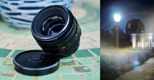 A camera lens with a detached cap rests on a tiled surface, shown on the left. On the right, a photo of a streetlamp at night displays prominent lens flare near an observatory building.