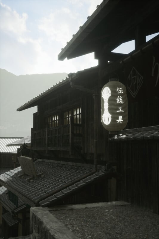 Japanese street scene with traditional wooden buildings and tiled roofs. A sign with Japanese characters hangs on one building. Mountains and a cloudy sky are in the background, creating a serene atmosphere.
