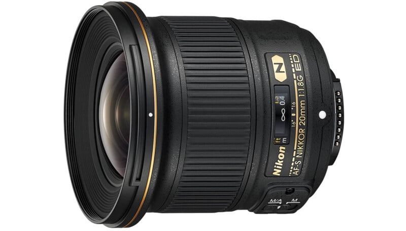 A wide-angle Nikon AF-S NIKKOR 20mm f/1.8G ED camera lens with a gold ring, textured focus ring, switches, and labeled markings on a white background.