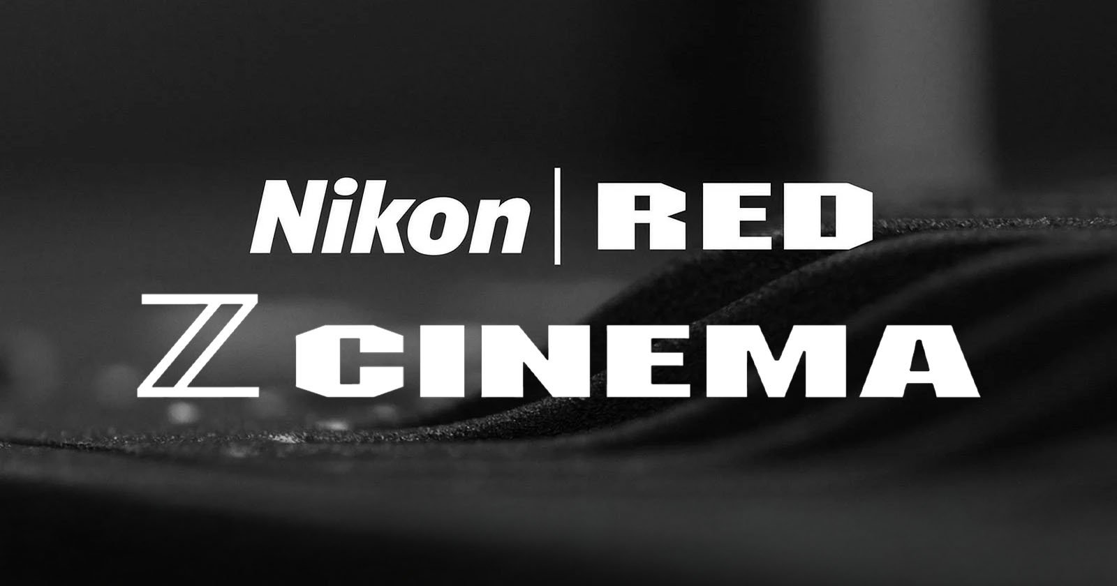 Black and white image showing the text "Nikon | RED Z Cinema" over a dark, textured background.